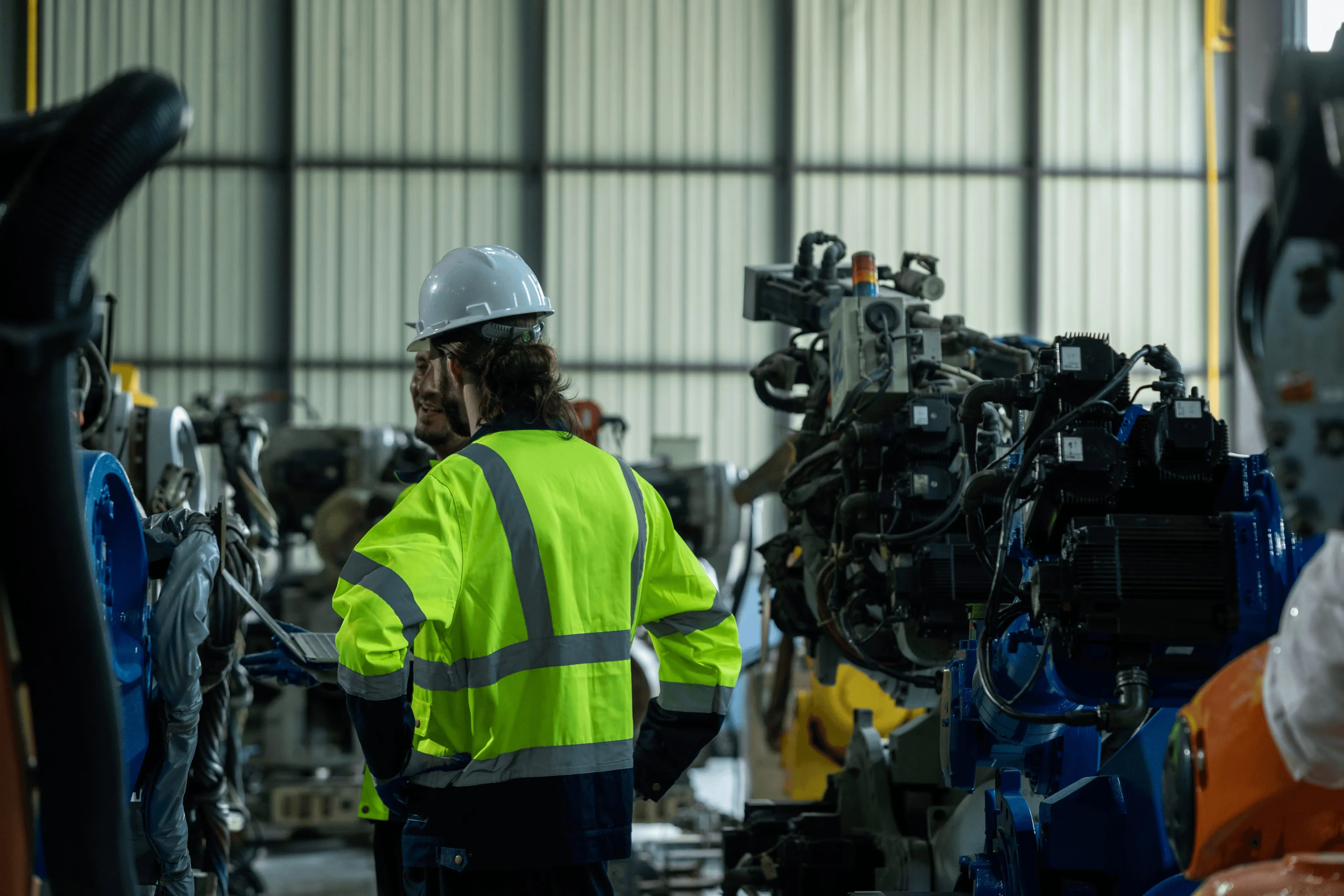 Factory worker in high-vis vest